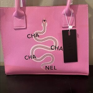 Pink vegan leather handbag. Never been used